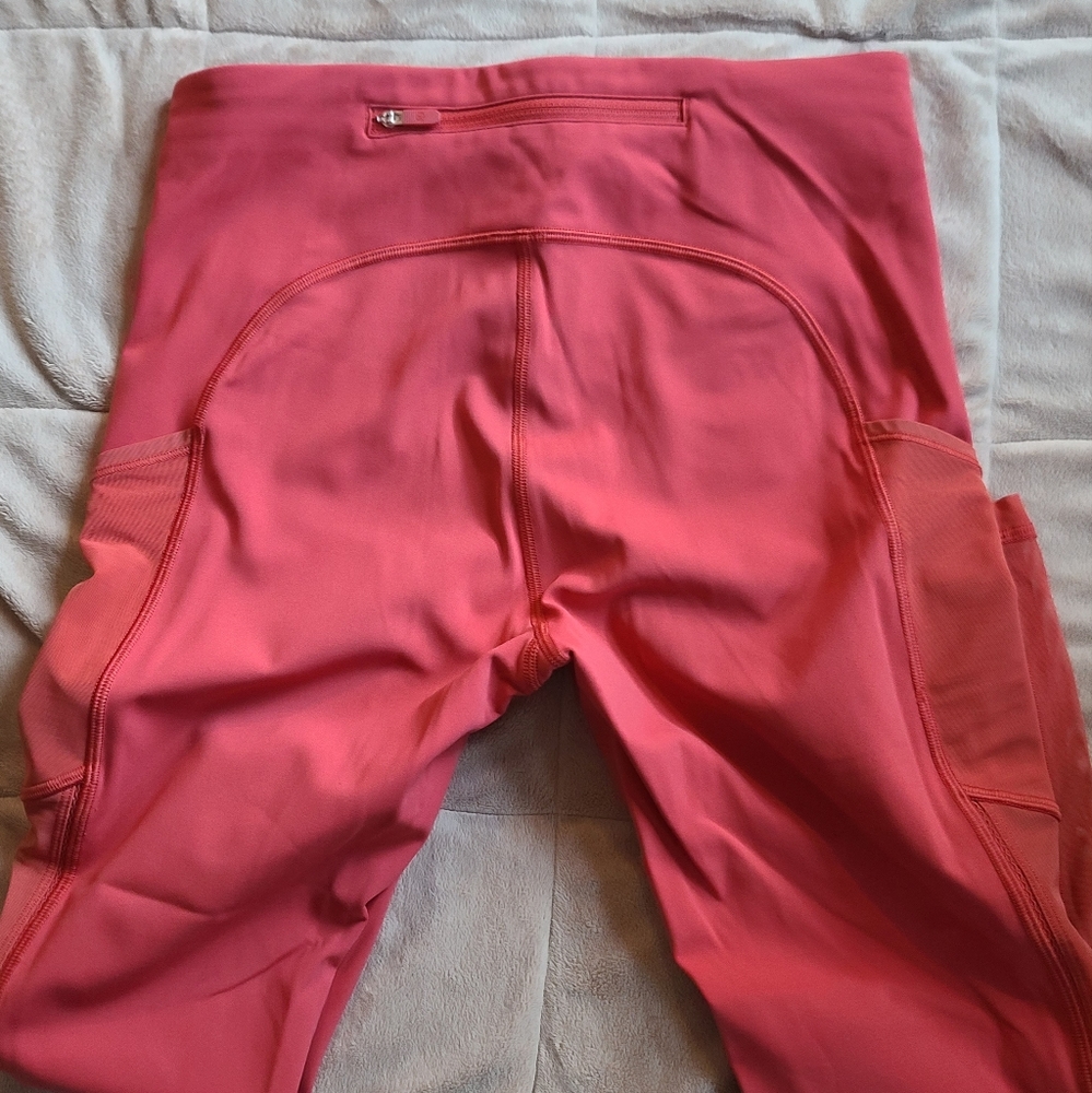 Lululemon Leggings - Orange/Brick Color with Pockets & side mesh